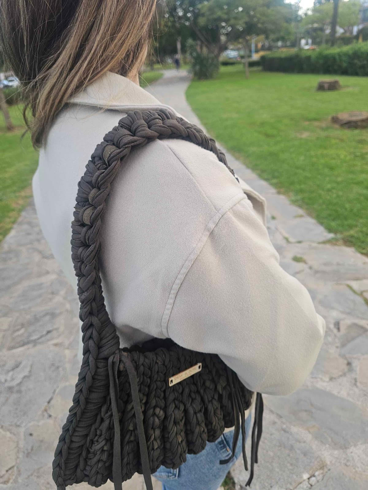 Braided Macrame Shoulder Bag — worn on shoulder, chunky braid texture with tassels